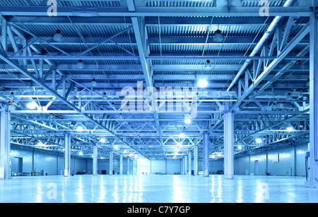 Empty storehouse toned in the blue color  Stock Photo