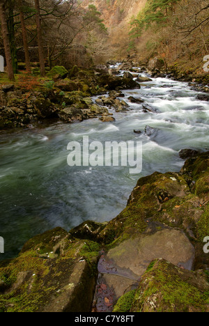 Glaslyn River flowing through the Aberglaslyn Pass in Snowdonia National Park, Wales renowned for it's crystal clear water and scenic beauty Stock Photo