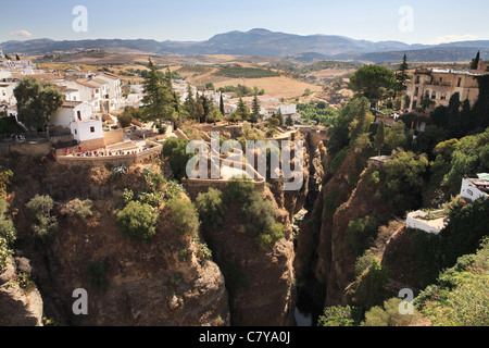 View of the gorge of El Tajo with the old or Arab bridge in the background, Ronda, Andalusia, Spain Stock Photo