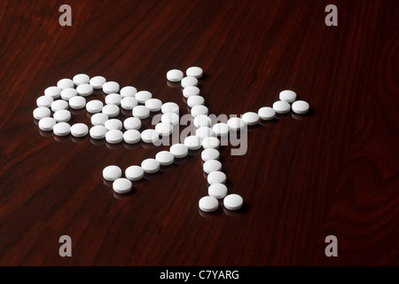 Skull and crossbones made up of white pills Stock Photo