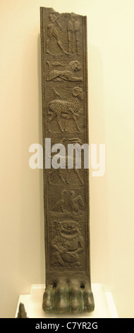 Greek Art. Archaic Age. 6th century BCE. Bronze tripod foot decorated with six reliefs. Stock Photo