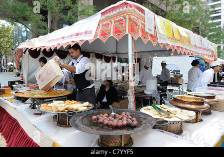 An Indian food vendor at a street fair in Manhattan. Oct. 2, 2011 Stock Photo