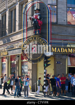 Madame Tussaud on Dam square, Amsterdam, the Netherlands, with many tourists. Stock Photo