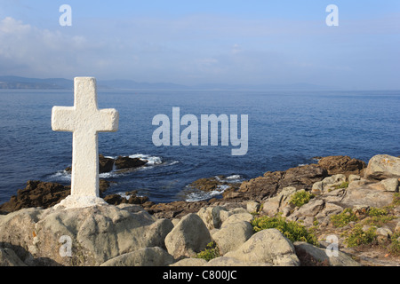 A cross near the Atlantic Ocean (Cabo Roncudo - Spain) Stock Photo