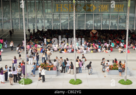Filipino domestic workers gather on their Sunday day off in Hong Kong's Central area Stock Photo