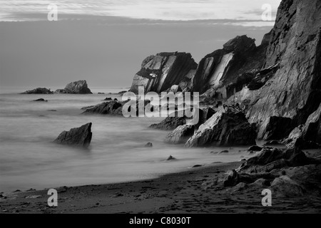 Rocky coast at Ayrmer Cove in the South Hams district of Devon Stock Photo