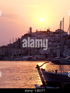 Greece, Saronic Islands, Poros, view over harbor at sunset Stock Photo