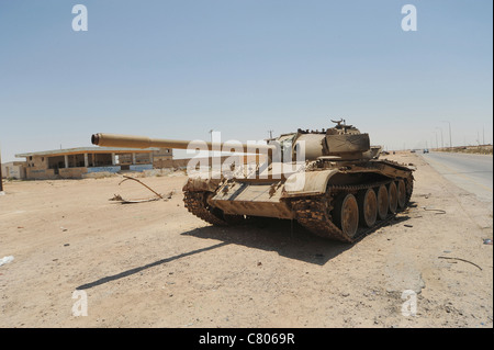 A T-55 tank destroyed by NATO forces in the desert north of Ajadabiya, Libya. Stock Photo