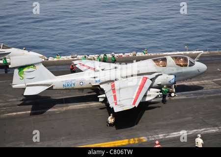 An EA-6B Prowler assigned to VAQ-130 is ready to go from the flight deck of USS Harry S. Truman. Stock Photo