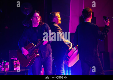 Alan Doyle plays guitar for GREAT BIG SEA. a singing group from Canada, preforming at the SUNSET CENTER - CARMEL, CALIFORNIA Stock Photo