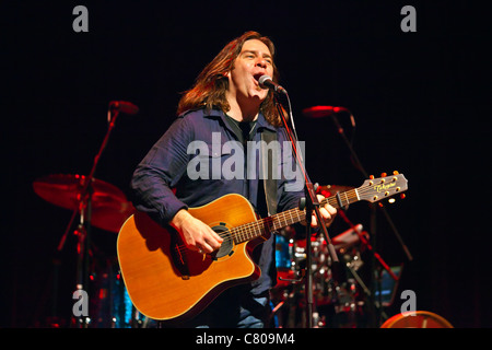 Alan Doyle plays guitar for GREAT BIG SEA. a singing group from Canada, preforming at the SUNSET CENTER - CARMEL, CALIFOR Stock Photo