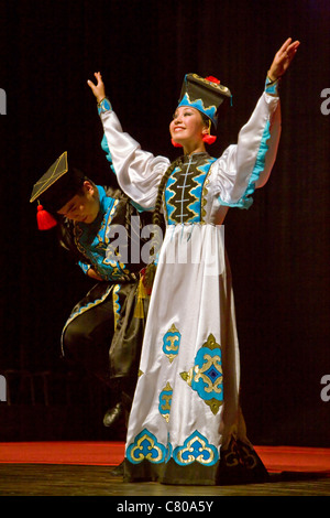 MONGOLIAN DANCERS at the TIBETAN MONGOLIAN CULTURAL CENTER at a Buddhist teaching by the 14th DALAI LAMA - BLOOMINGTON, INDIANA Stock Photo