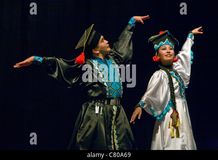 MONGOLIAN DANCERS at the TIBETAN MONGOLIAN CULTURAL CENTER at a Buddhist teaching by the 14th DALAI LAMA - BLOOMINGTON, INDIANA Stock Photo