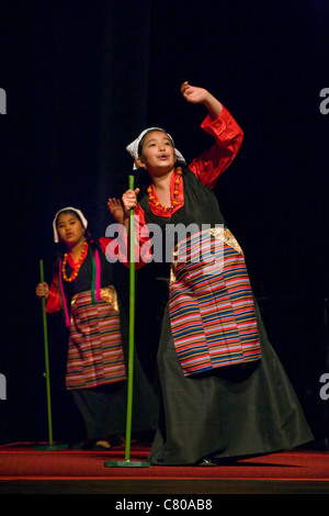 TIBETAN DANCERS at the TIBETAN MONGOLIAN CULTURAL CENTER during a teaching by the 14th DALAI LAMA - BLOOMINGTON, INDIANA Stock Photo