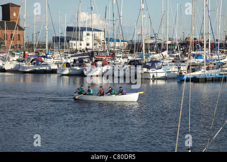 Sea Cadets training in a rowing boat in Clyde Marina at Ardrossan Harbour on the River Clyde, North Ayrshire, Scotland, UK Stock Photo