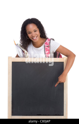 education series template - Friendly ethnic black woman high school student by chalkboard Stock Photo