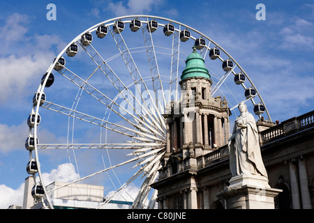 Northern Ireland, Belfast, the City Hall and the big wheel Stock Photo