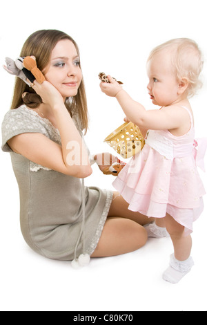 Mother and daughter playing with finger puppets. Stock Photo