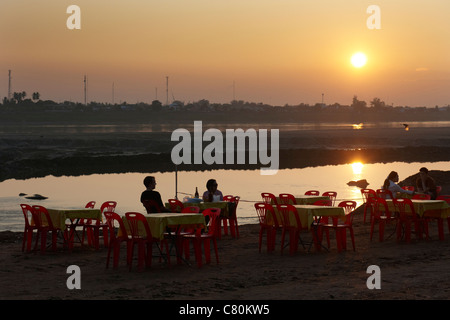 Laos, Vientiane, Mekong River Side at Sunset Stock Photo