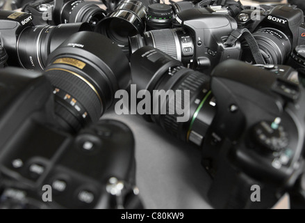 Digital cameras of different brands collected together Stock Photo