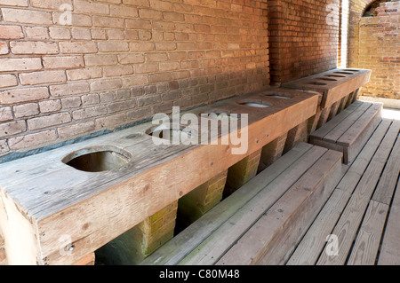 Alabama, Dauphin Island, Fort Gaines Historic Site, ten seater latrine outhouse Stock Photo