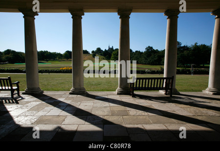 View through the colonnade of the National Maritime Museum to the Royal Observatory in Greenwich Park, Greenwich, London, UK Stock Photo