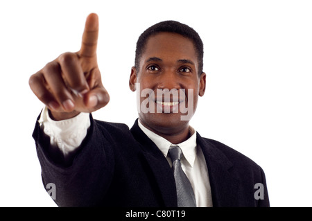 Young & Confident African American Business Man touching an imaginary screen isolated white background Stock Photo