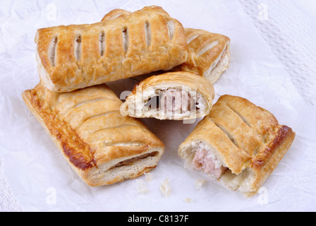 Large sausage rolls on a white kitchen towel Stock Photo