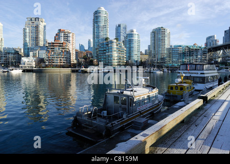 Frosted docks of Granville Island looking northwest across False creek harbour towards Yaletown, Vancouver City. Stock Photo