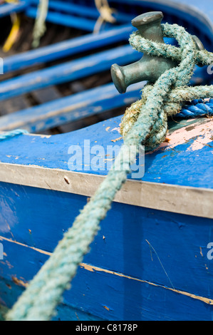 Detail of an old weathered rowing boat in the harbour at Portmagee in County Kerry, Ireland Stock Photo