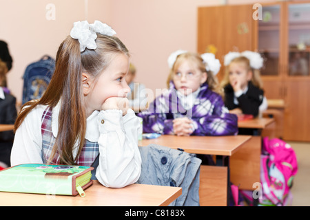 A pupil boring a lesson in first grade in elementary school. St. Petersburg, Russia Stock Photo