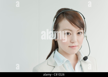 Businesswoman Using Headset Stock Photo