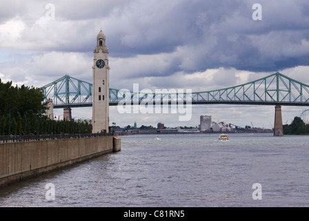 Clock Tower and Jacques Cartier Bridge, Montreal. Stock Photo