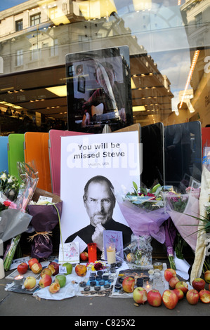 Steve Jobs death memorial shrine Apple Store flowers apples and cards outside the Regent Street store London 7th October 2011 Stock Photo