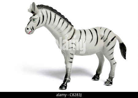 Plastic toy zebra figurine isolated on white background  Model Release: No.  Property release: No. Stock Photo