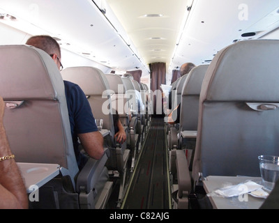 Aeroplane passengers on an airplane Stock Photo