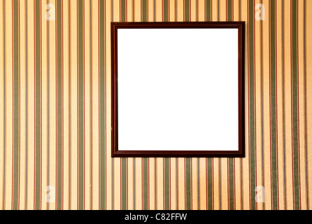 Blank frame on wall with striped wallpaper Stock Photo