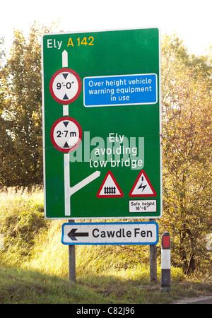 british road sign warning of height restriction, at a rail bridge in ...