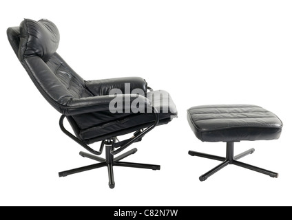 Black leather reclining chair and footstool on white background Stock Photo