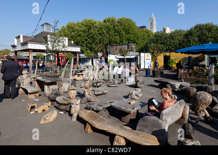 Wooden sculptures by Friedel Buecking at Gabriel's Wharf, Southbank, London, England, UK. Stock Photo