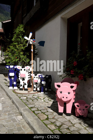 Carved animal planters in Brienz, Switzerland. Stock Photo