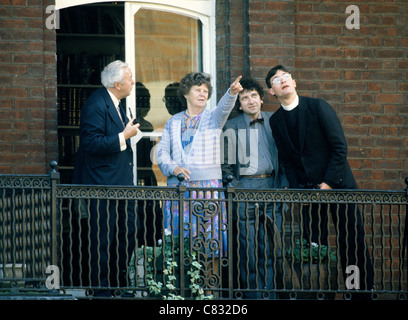 Retired UK Prime Minister Harold Wilson with Lady Wilson and friends on the balcony of his Westminster apartment  London England Stock Photo