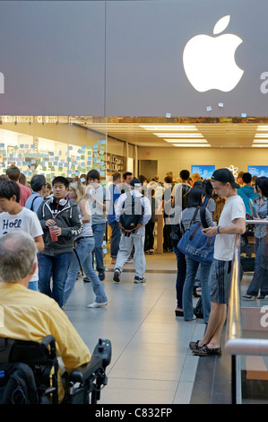 People inside browsing the products at the Apple store in Liverpool One ...