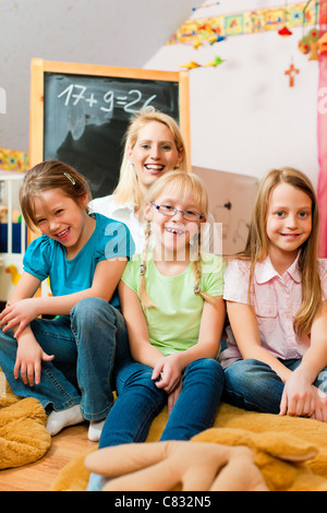 Family - mother with her daughters; all of them going to school already Stock Photo