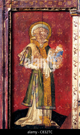 Ranworth, Norfolk, rood screen, St. Stephen, holding the stones of his martyrdom English medieval screens painting paintings Stock Photo