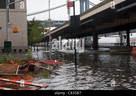 Flooded street under Manhattan Bridge in NYC, during Hurricane Irene. New York City, USA Stock Photo