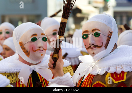 festival carnival participants binche belgium traditional head-dress costume costumes people display color colour colorful mask Stock Photo