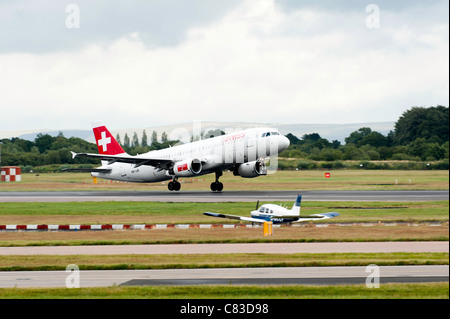 Swiss International Air Lines Airbus A320 Airliner Taking Off From Manchester International Airport England United Kingdom UK Stock Photo