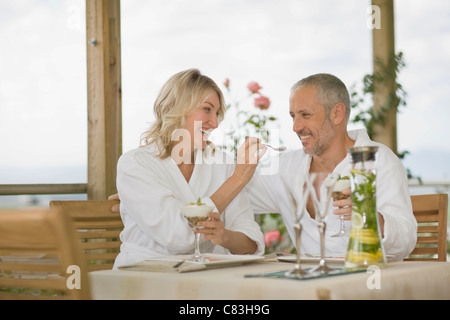 https://l450v.alamy.com/450v/c83h9g/couple-in-bathrobes-having-breakfast-c83h9g.jpg