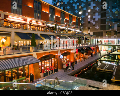 Restaurants and bars alongside the canal at The Mailbox, Birmingham City Centre In the West Midlands in Britain Stock Photo